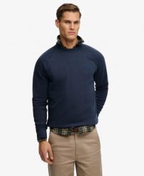 Superdry Bluza Raglan Essential Logo Luźny krój – CLASSIC NAVY. Niebieskie bluzy Superdry, na jesień, m, bez wzorów, z bawełny, bez kaptura. Za 254.45 zł.