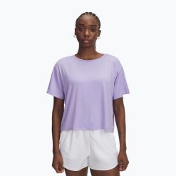 Koszulka Under Armour Motion. Fioletowe bluzki Under Armour, bez wzorów, sportowe, bez kołnierzyka, bez ramiączek. Za 129.99 zł.