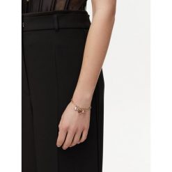 Bransoletka Guess. Żółte bransoletki Guess, złote. Za 169.99 zł.