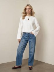 Bawełniane jeansy baggy z efektem sprania - niebieski. Niebieskie jeansy Sinsay, l, bez wzorów. Za 59.99 zł.