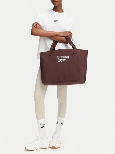 Reebok Torebka CWBEO-RBK-B-003-07 Brązowy ciemny. Brązowe shopper Reebok, bez wzorów, z materiału, bez dodatków. Za 99.99 zł.