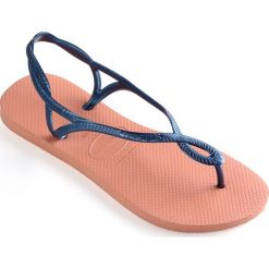 Havaianas - Sandały. Czerwone sandały Havaianas, bez wzorów, z gumy, bez obcasa, na płaskiej podeszwie, bez zapięcia. W wyprzedaży za 59.90 zł.