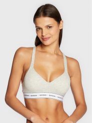 Guess Biustonosz top O1GC15 KBBU1 Szary. Szare biustonosze Guess, xs, z aplikacjami, z bawełny, bez kołnierzyka, bez ramiączek. Za 99.99 zł.