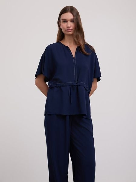 BGN Bluzka w kolorze granatowym rozmiar: 38. Niebieskie bluzki BGN, bez wzorów, bez kołnierzyka, bez ramiączek. Za 52.42 zł.