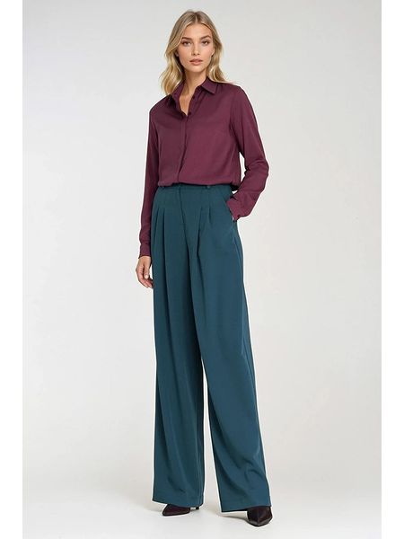 Nife Spodnie w kolorze niebieskim rozmiar: 42. Niebieskie spodnie materiałowe Nife, bez wzorów, z materiału, z podwyższonym stanem. Za 178.79 zł.