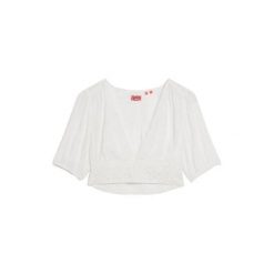 Koszulka damska z koronkowym wykończeniem Superdry Ibiza. Białe bluzki Superdry, l, bez wzorów, z koronki, boho, bez kołnierzyka, bez ramiączek. Za 284.00 zł.