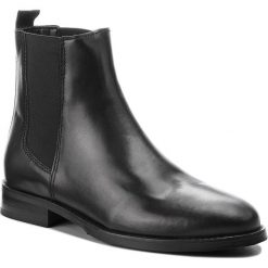 Sztyblety TOMMY JEANS - Basic Classic Chelse EN0EN00260 Black 990. Czarne botki Tommy Jeans, bez wzorów, z jeansu, bez obcasa, na obcasie, bez zapięcia. W wyprzedaży za 449.00 zł.
