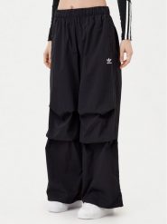 Adidas Spodnie dresowe Essentials Ripstop JD0785 Czarny Loose Fit. Czarne spodnie dresowe Adidas, l, bez wzorów, z dresówki. Za 169.99 zł.