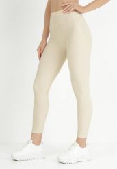 Jasnobeżowe Legginsy Amarhiphae. Brązowe legginsy Born2be, m, z aplikacjami, z dzianiny, długie. Za 49.99 zł.