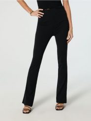 Legginsy z rozszerzaną nogawką - czarny. Czarne legginsy Sinsay, l, bez wzorów. Za 29.99 zł.