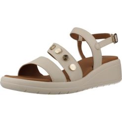 Sandały GEOX D MELICONIA Beżowy. Brązowe sandały Geox, bez wzorów, z syntetyku, bez obcasa, bez zapięcia. Za 322.99 zł.