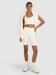 4F Legginsy kolarki treningowe bezszwowe damskie - beżowe XS/S. Brązowe legginsy 4f, l, bez wzorów, z dzianiny, z podwyższonym stanem, krótkie. Za 119.99 zł.