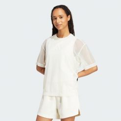 Koszulka Soft Lux Mesh. Białe bluzki Adidas, xl, bez wzorów, z meshu, sportowe, bez kołnierzyka, bez ramiączek. Za 179.00 zł.