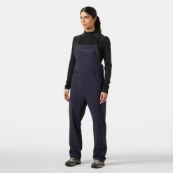 Kombinezony damskie Helly Hansen Awe. Fioletowe spodnie sportowe Helly Hansen, na lato, bez wzorów, trekkingowe. Za 603.50 zł.