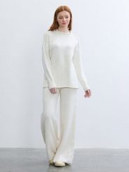 BGN Sweter w kolorze kremowym rozmiar: 36. Brązowe swetry BGN, bez wzorów, ze splotem, bez ramiączek. Za 86.99 zł.