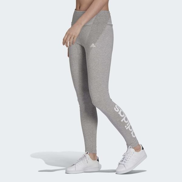 Leginnsy Essentials High-Waisted Logo. Białe obuwie sportowe Adidas, z bawełny, bez zapięcia, na fitness i siłownię. Za 105.00 zł.