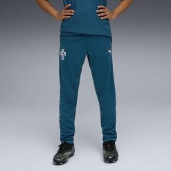 Młodzieżowe spodnie treningowe Portugalia PUMA. Niebieskia spodnie dresowe Puma, m, bez wzorów. Za 279.00 zł.