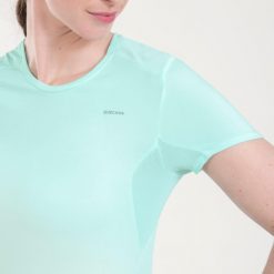 Koszulka turystyczna damska z krótkim rękawem Quechua MH100. Zielone bluzki QUECHUA, m, bez wzorów, z elastanu, sportowe, bez kołnierzyka, bez ramiączek. Za 34.99 zł.