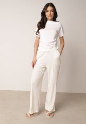 Jasnobeżowe Szerokie Spodnie z Prążkowanej Tkaniny z Wysokim Stanem Sarora. Brązowe spodnie materiałowe Born2be, na co dzień, m, bez wzorów, z jeansu, z podwyższonym stanem. Za 59.99 zł.