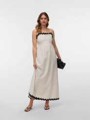 Vero Moda Sukienka w kolorze beżowym rozmiar: XS. Brązowe sukienki Vero Moda, xs, bez wzorów, z bawełny, bez kołnierzyka, bez ramiączek, maxi, rozkloszowane. Za 96.14 zł.