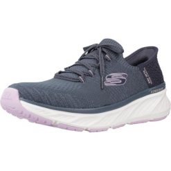 Kapcie SKECHERS SLIP-INS EDGERIDE Niebieski. Niebieskie obuwie domowe Skechers, bez wzorów, z tkaniny, bez zapięcia. Za 362.99 zł.