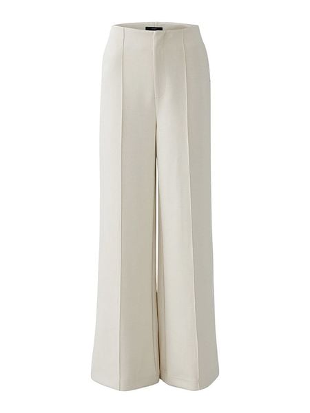 Oui Spodnie w kolorze kremowym rozmiar: 38. Brązowe spodnie materiałowe Oui, bez wzorów, z materiału. Za 339.99 zł.