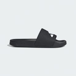 Klapki ADILETTE SHOWER SLIDES. Białe klapki Adidas, bez wzorów, bez obcasa. Za 119.00 zł.