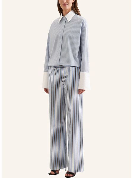 Seidensticker Spodnie w kolorze błękitno-biało-granatowym rozmiar: 42. Białe spodnie materiałowe Seidensticker, bez wzorów, z bawełny, z podwyższonym stanem. Za 104.89 zł.