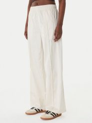 Adidas Spodnie dresowe Pearl Firebird KE3393 Écru Loose Fit. Spodnie dresowe Adidas, l, bez wzorów, z dresówki. Za 349.99 zł.