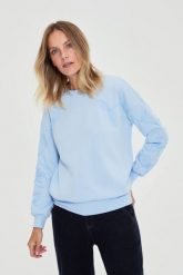 Bluza wkładana przez głowę błękitna. Niebieskie bluzy MOODO, m, bez wzorów, z bawełny, bez kaptura. Za 139.99 zł.