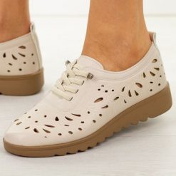 Beżowe ażurowe półbuty damskie Potocki 16388. Brązowe obuwie sportowe POTOCKI, na lato, z dresówki, bez zapięcia. W wyprzedaży za 104.72 zł.