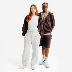 Bluza na suwak unisex Elementals. Brązowe bluzy DECATHLON, uniwersalny, bez wzorów, z bawełny, z kapturem. Za 199.99 zł.