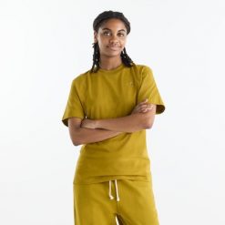 Koszulka damska New Balance WT41501BIL – żółta. Żółte bluzki New Balance, s, bez wzorów, z materiału, eleganckie, bez kołnierzyka, bez ramiączek. Za 179.99 zł.