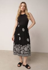 Czarna Rozkloszowana Spódnica z Wiskozy w Kwiatowy Wzór Masterore. Czarne spódnice Born2be, do pracy, uniwersalny, bez wzorów, z jeansu, biznesowe, midi, dopasowane. Za 59.99 zł.