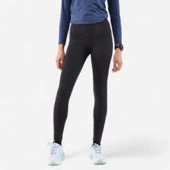 Legginsy do biegania damskie Kiprun Run 500 Warm ocieplane. Niebieskie legginsy KIPRUN, na zimę, l, bez wzorów, z materiału, do biegania. Za 129.99 zł.