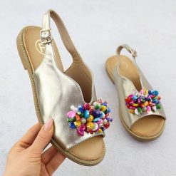 Sandały damskie z koralikami złote Filippo DS6230. Żółte sandały Filippo, bez wzorów, ze skóry ekologicznej, bez obcasa, bez zapięcia. Za 129.99 zł.