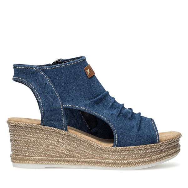 Sandały Rieker. Niebieskie sandały Rieker, bez wzorów, bez obcasa, na koturnie, bez zapięcia. Za 329.99 zł.
