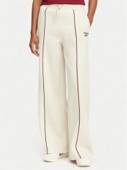 Reebok Spodnie dresowe Oliwia RK25683CCW Beżowy Regular Fit. Brązowe spodnie dresowe Reebok, s, bez wzorów, z bawełny. Za 199.99 zł.