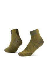 Skarpety do biegania Coolnet Quarter. Zielone skarpety Buff, bez wzorów, z poliamidu. Za 99.99 zł.