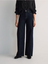 Jeansy wide leg - granatowy. Niebieskie jeansy Reserved, bez wzorów. W wyprzedaży za 99.99 zł.