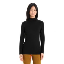 Koszulka z długim rękawem Damska Icebreaker 260 Tech LS Turtleneck. Czarne bluzki Icebreaker, s, bez wzorów, z wełny, sportowe, bez kołnierzyka, bez ramiączek. Za 507.55 zł.