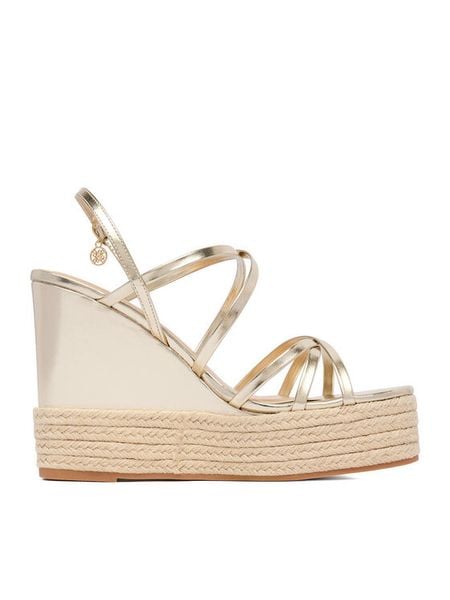 Nine West Sandały CEO-SW25-3 04 Złoty. Żółte sandały Nine West, bez wzorów, z materiału, bez obcasa, na koturnie, bez zapięcia. Za 159.99 zł.