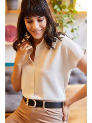 Olalook Bluzka "Olalook" w kolorze kremowym rozmiar: XL. Brązowe bluzki Olalook, xl, bez wzorów, z wiskozy, bez kołnierzyka, bez ramiączek. Za 43.78 zł.