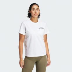 Koszulka Terrex Graphic. Białe bluzki Adidas, m, bez wzorów, z bawełny, sportowe, bez kołnierzyka, bez ramiączek. Za 149.00 zł.