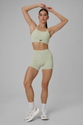 4F Legginsy krótkie treningowe bezszwowe damskie - zielone XS/S. Zielone legginsy 4f, s, bez wzorów, ze skóry, z podwyższonym stanem, krótkie. Za 119.99 zł.