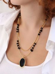 Pierres delicates Pozłacany naszyjnik z elementami ozdobnymi - dł. 45 cm rozmiar: onesize. Czarne naszyjniki Pierres delicates, z onyksem, pozłacane. Za 69.99 zł.