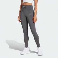 Legginsy Running Essentials. Szare legginsy Adidas, xs, bez wzorów, z materiału, do biegania. W wyprzedaży za 176.00 zł.