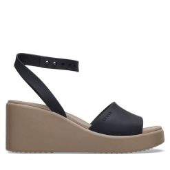 Sandały Crocs. Czarne sandały Crocs, bez wzorów, bez obcasa, na koturnie, bez zapięcia. Za 249.99 zł.