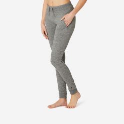 Spodnie dresowe damskie Domyos Gym & Pilates 520 slim. Szare spodnie sportowe DOMYOS, s, bez wzorów, z bawełny, na fitness i siłownię. Za 99.99 zł.
