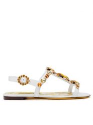 Dolce&Gabbana Sandały CQ0601 AT848 Biały. Białe sandały Dolce&Gabbana, bez wzorów, ze skóry, bez obcasa, na płaskiej podeszwie, bez zapięcia. Za 3,869.00 zł.